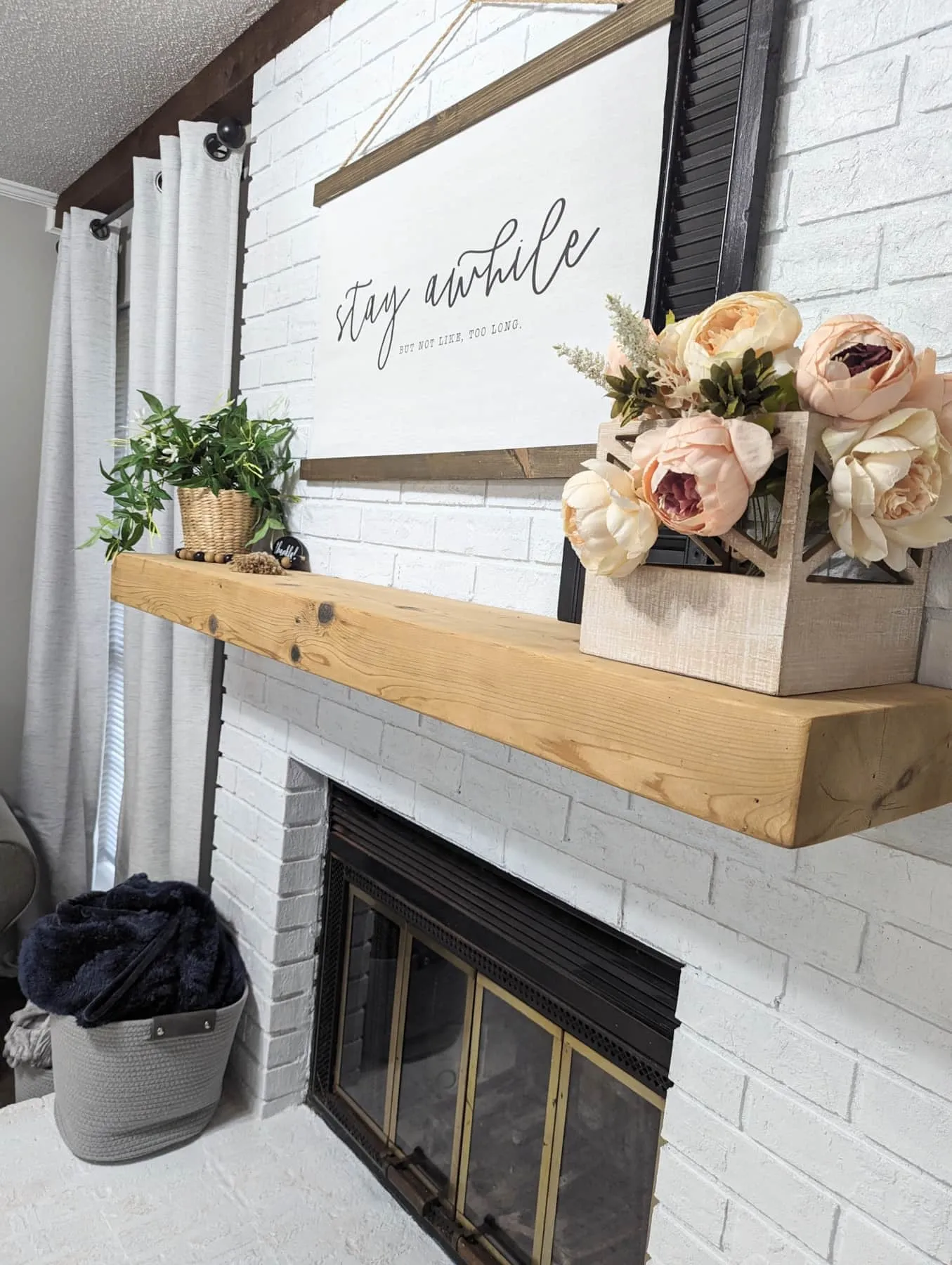 Cozy fireplace and decorative details in a Blue Brick home